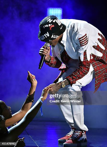 Singer August Alsina performs onstage during the BET AWARDS '14 at Nokia Theatre L.A. LIVE on June 29, 2014 in Los Angeles, California.