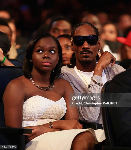 Recording artist Snoop Dogg and Cori Broadus attend the BET AWARDS '14 at Nokia Theatre L.A. LIVE on June 29, 2014 in Los Angeles, California.