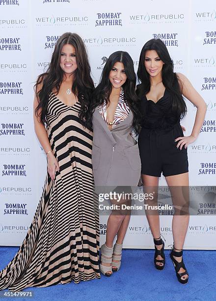 Khloe Kardashian, Kourtney Kardashian and Kim Kardashian arrive at Wet Republic on April 24, 2010 in Las Vegas, Nevada.