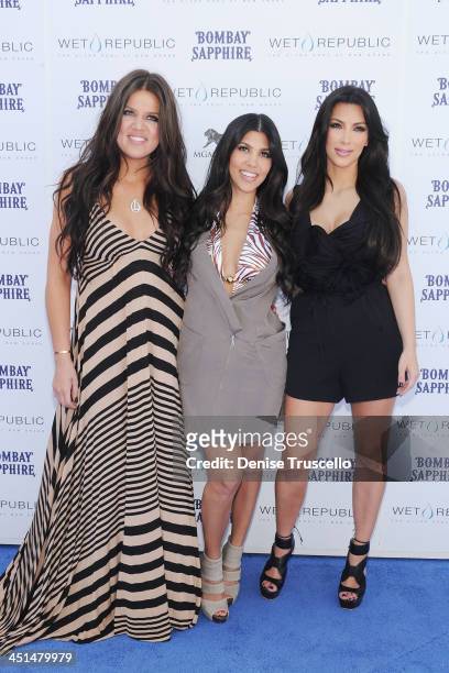 Khloe Kardashian, Kourtney Kardashian and Kim Kardashian arrive at Wet Republic on April 24, 2010 in Las Vegas, Nevada.