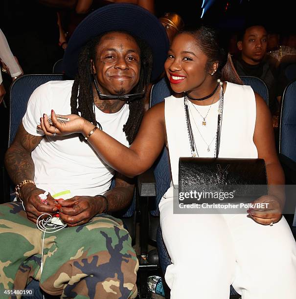 Rapper Lil Wayne and Reginae Carter attend the BET AWARDS '14 at Nokia Theatre L.A. LIVE on June 29, 2014 in Los Angeles, California.