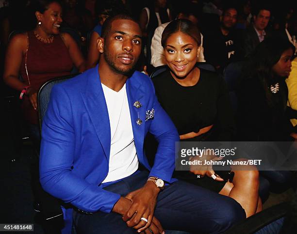 Player Chris Paul and Jada Crawley pose in the audience at the BET AWARDS '14 at Nokia Theatre L.A. LIVE on June 29, 2014 in Los Angeles, California.