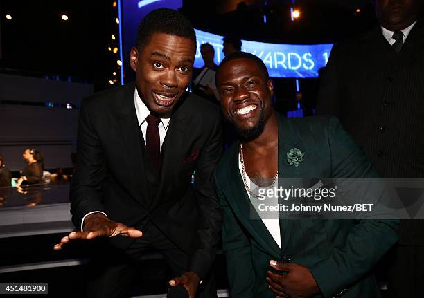 Host Chris Rock and actor Kevin Hart during the BET AWARDS '14 at Nokia Theatre L.A. LIVE on June 29, 2014 in Los Angeles, California.