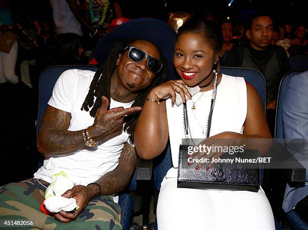 Rapper Lil Wayne and Reginae Carter attend the BET AWARDS '14 at Nokia Theatre L.A. LIVE on June 29, 2014 in Los Angeles, California.