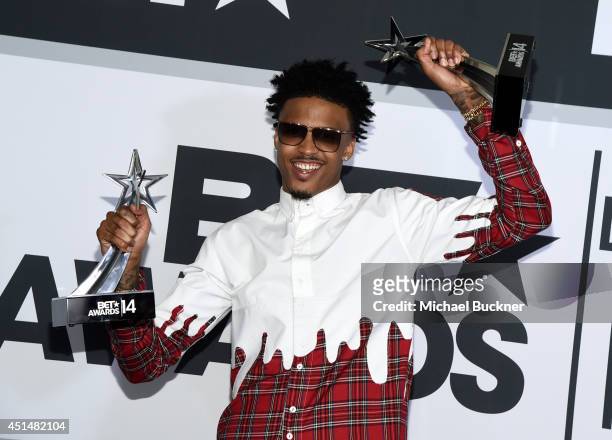 Singer August Alsina poses in the press room during the BET AWARDS '14 at Nokia Theatre L.A. LIVE on June 29, 2014 in Los Angeles, California.