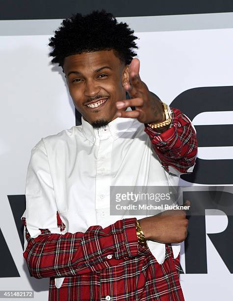 Singer August Alsina poses in the press room during the BET AWARDS '14 at Nokia Theatre L.A. LIVE on June 29, 2014 in Los Angeles, California.