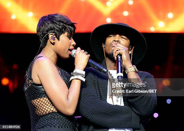 Singer Jennifer Hudson and recording artist Ne-Yo perform onstage at the Mary J. Blige, Trey Songz And Jennifer Hudson Concert Presented By King.com...