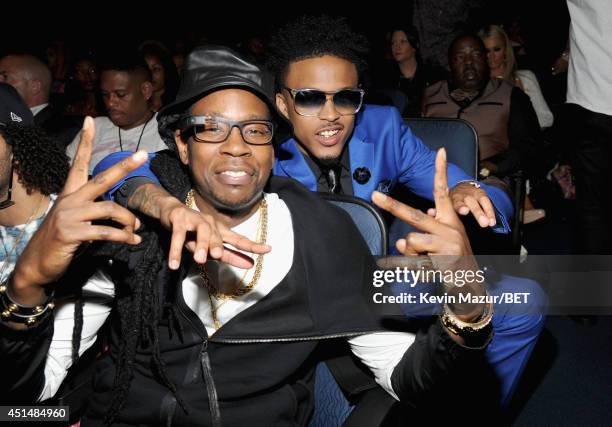Recording artist 2 Chainz and singer August Alsina attend the BET AWARDS '14 at Nokia Theatre L.A. LIVE on June 29, 2014 in Los Angeles, California.