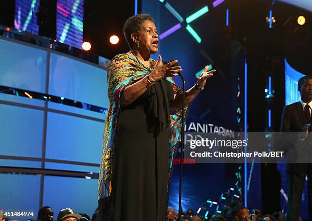 Civil rights activist Myrlie Evers-Williams accepts the BET Humanitarian Award onstage during the BET AWARDS '14 at Nokia Theatre L.A. LIVE on June...