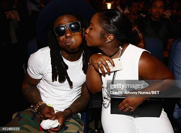 Rapper Lil Wayne and Reginae Carter attend the BET AWARDS '14 at Nokia Theatre L.A. LIVE on June 29, 2014 in Los Angeles, California.