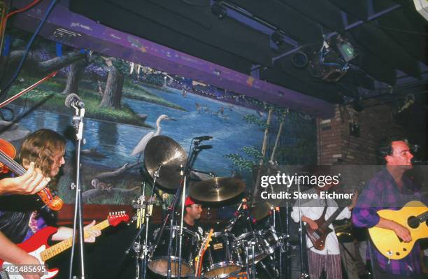 American rock group the Dave Matthews Band, along with musician Warren Hayes, performs on stage at the Wetlands Preserve nightclub, August 19, 1993.