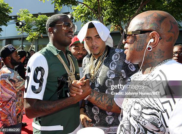 Rappers Meek Mill, French Montana and Birdman attend the BET AWARDS '14 at Nokia Theatre L.A. LIVE on June 29, 2014 in Los Angeles, California.