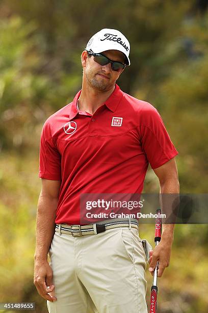 Adam Scott of Australia looks dejected after missing a putt during day three of the World Cup of Golf at Royal Melbourne Golf Course on November 23,...