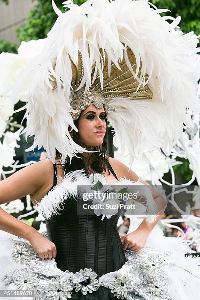 Attendees and marchers on the streets of downtown Seattle for the 40th Annual Seattle Pride Parade on June 29, 2014 in Seattle, Washington.