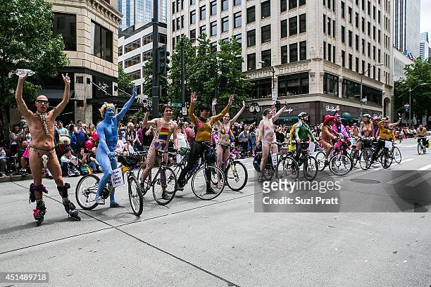 Attendees and marchers on the streets of downtown Seattle for the 40th Annual Seattle Pride Parade on June 29, 2014 in Seattle, Washington.