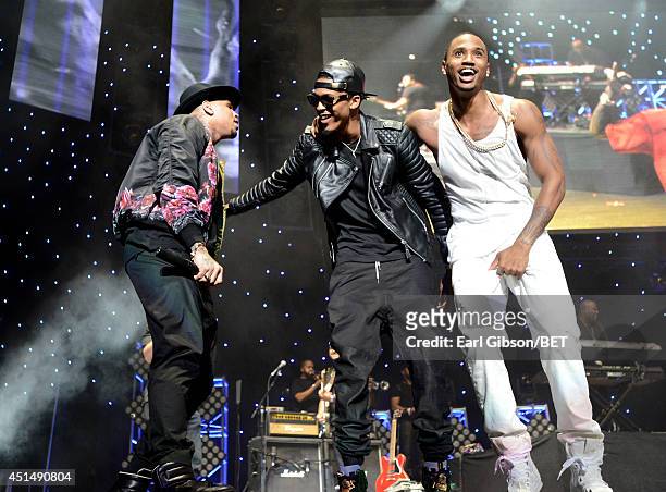 Recording artist Chris Brown, singer August Alsina, and rapper Trey Songz perform onstage at the Mary J. Blige, Trey Songz And Jennifer Hudson...
