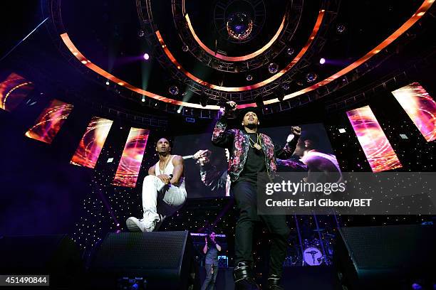 Singer Trey Songz and recording artist Chris Brown perform onstage at the Mary J. Blige, Trey Songz And Jennifer Hudson Concert Presented By King.com...