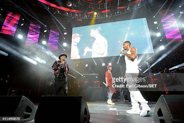 Recording artist Chris Brown, rapper Tyga, and singer Trey Songz perform onstage at the Mary J. Blige, Trey Songz And Jennifer Hudson Concert...