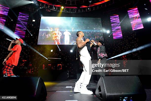 Rapper Tyga, singer Trey Songz, and recording artist recording artist Chris Brown perform onstage at the Mary J. Blige, Trey Songz And Jennifer...