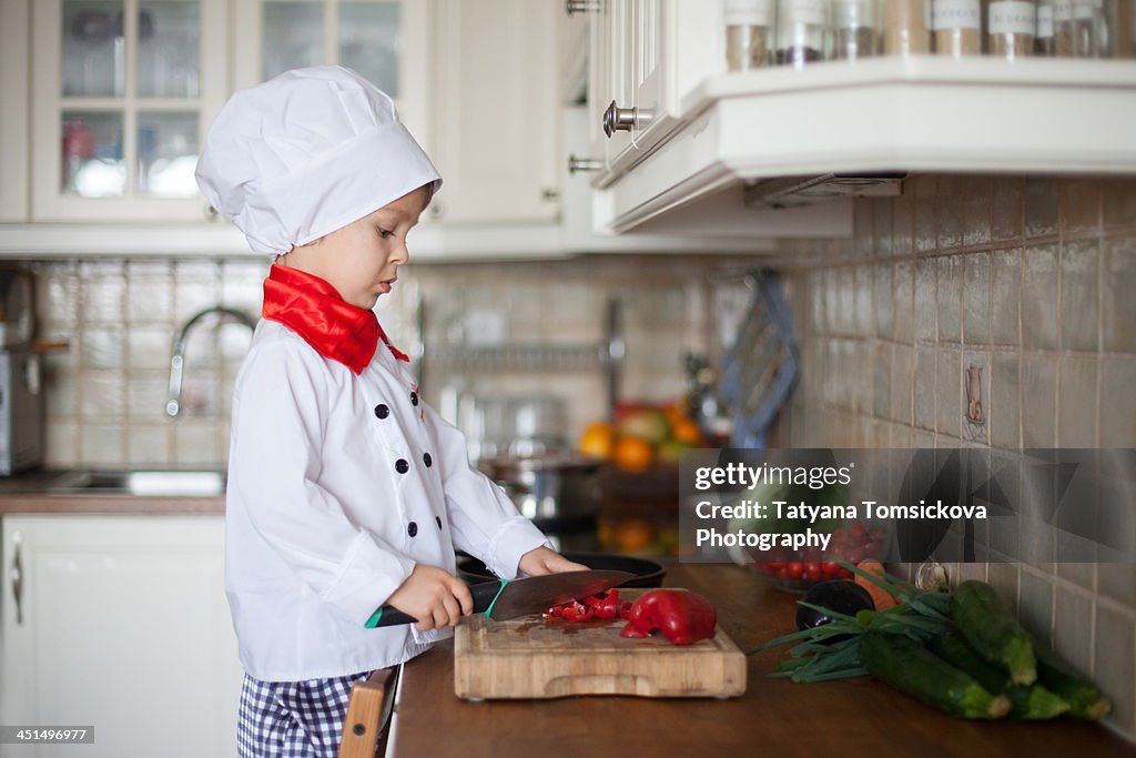 In the kitchen with the head cook