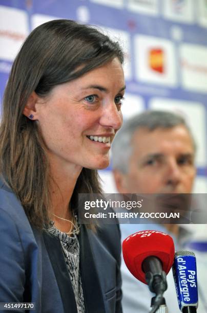 Corinne Diacre, the former captain of the French national women's football team, speaks next to Club president Claude Michy during her first press...