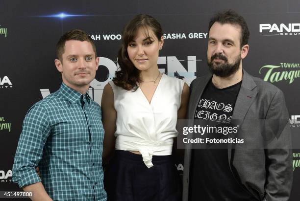 Actors Elijah Wood and Sasha Grey and director Nacho Vigalondo attend the 'Open Windows' photocall at User on June 30, 2014 in Madrid, Spain