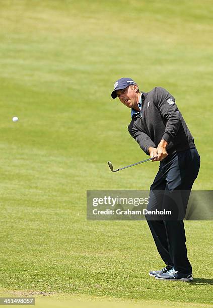 Matt Kuchar of the USA chips onto the green during day three of the World Cup of Golf at Royal Melbourne Golf Course on November 23, 2013 in...