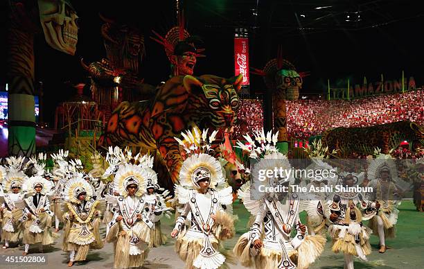 Participants perform during the Boi Bumba festival on June 27, 2014 in Parintins, Brazil. The festival is thought to be the beiggest outdoor opera in...