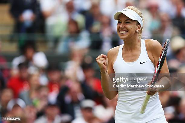 Sabine Lisicki of Germany celebrates after winning her Ladies' Singles fourth round match against Ana Ivanovic of Serbia on day seven of the...