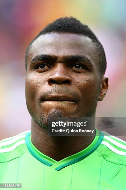 Emmanuel Emenike of Nigeria looks on during the National Anthem prior to 2014 FIFA World Cup Brazil Round of 16 match between France and Nigeria at...