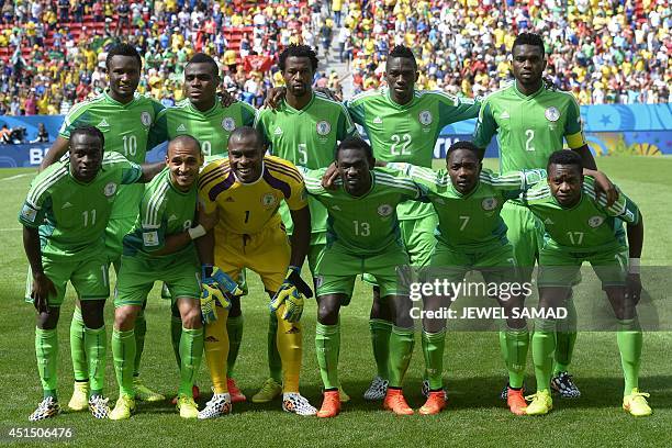 Nigeria's national team players pose for a picture prior to a Round of 16 football match between France and Nigeria at Mane Garrincha National...