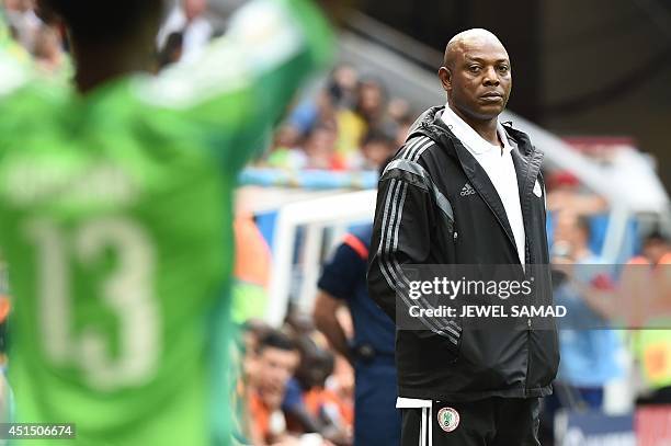Nigeria's coach Stephen Keshi is pictured during a Round of 16 football match between France and Nigeria at Mane Garrincha National Stadium in...