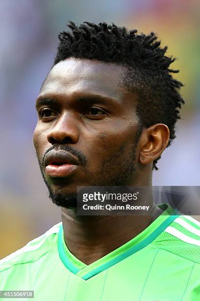 Joseph Yobo of Nigeria looks on during the National Anthem prior to 2014 FIFA World Cup Brazil Round of 16 match between France and Nigeria at...
