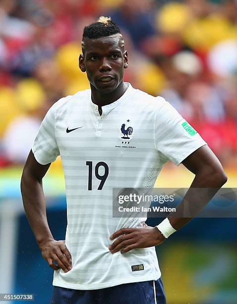 Paul Pogba of France reacts during the 2014 FIFA World Cup Brazil Round of 16 match between France and Nigeria at Estadio Nacional on June 30, 2014...