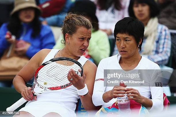 Barbora Zahlavova Strycova of Czech Republic and Kimiko Date-Krumm of Japan during their Ladies Doubles Second round match against Ashleigh Barty and...
