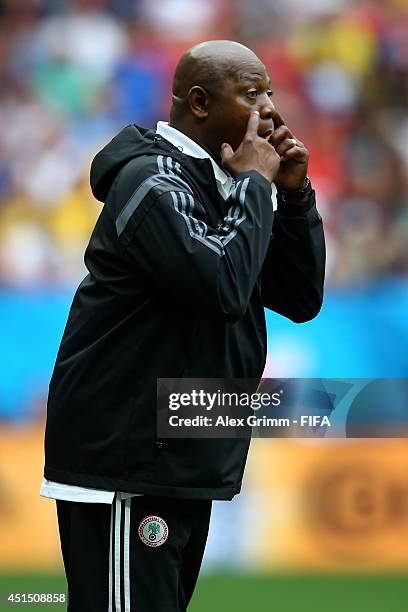 Head coach Stephen Keshi of Nigeria gestures during the 2014 FIFA World Cup Brazil Round of 16 match between France and Nigeria at Estadio Nacional...