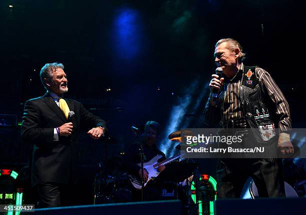 Larry Gatlin and Stonewall Jackson perform during Playin' Possum! The Final No Show Tribute To George Jones - Show at Bridgestone Arena on November...