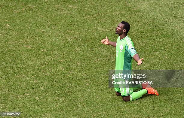 Nigeria's defender Juwon Oshaniwa reacts during a Round of 16 football match between France and Nigeria at Mane Garrincha National Stadium in...