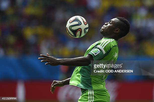 Nigeria's forward Emmanuel Emenike plays the ball during a Round of 16 football match between France and Nigeria at Mane Garrincha National Stadium...