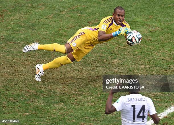 Nigeria's goalkeeper Vincent Enyeama defends his goal during a Round of 16 football match between France and Nigeria at Mane Garrincha National...