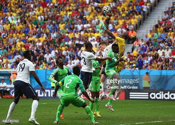 Paul Pogba of France scores his team's first goal on a header past Vincent Enyeama of Nigeria during the 2014 FIFA World Cup Brazil Round of 16 match...