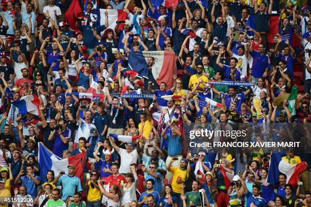 France's fans react during a Round of 16 football match between France and Nigeria at Mane Garrincha National Stadium in Brasilia during the 2014...