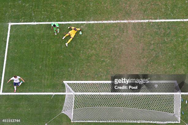 Joseph Yobo of Nigeria scores an own goal as goalkeeper Vincent Enyeama and Antoine Griezmann of France look on during the 2014 FIFA World Cup Brazil...