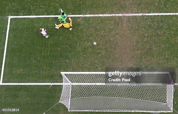 Joseph Yobo of Nigeria scores an own goal as goalkeeper Vincent Enyeama and Antoine Griezmann of France look on during the 2014 FIFA World Cup Brazil...