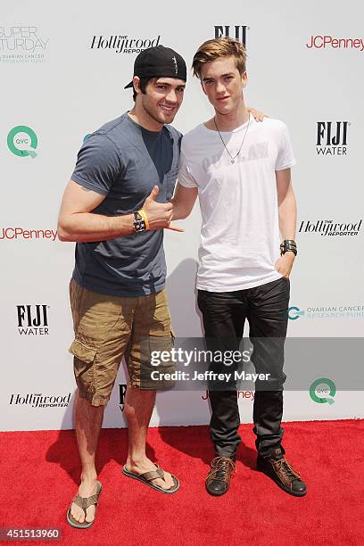 Actor Steven R. McQueen and singer Jessarae Robitaille arrive at the Ovarian Cancer Research Fund's Inaugural Super Saturday LA event at Barker...