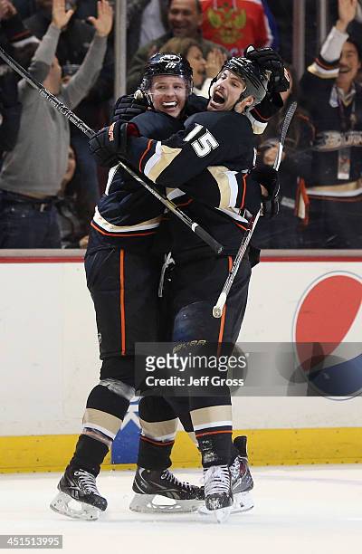 Hampus Lindholm and Ryan Getzlaf of the Anaheim Ducks celebrate Getzlaf's game winning goal in overtime against the Tampa Bay Lightning at Honda...