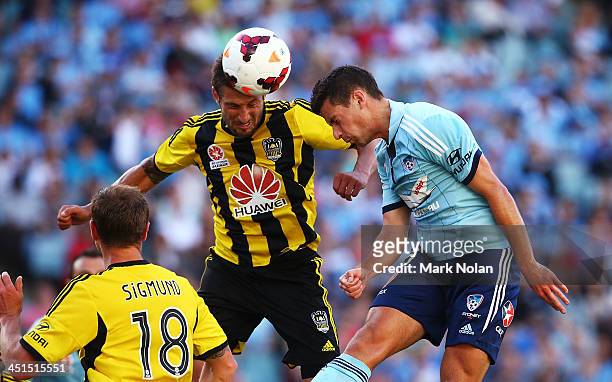Jeremy Brockie of the Phoenix and Joel Chianese of Sydney contest possession during the round seven A-League match between Sydney FC and the...
