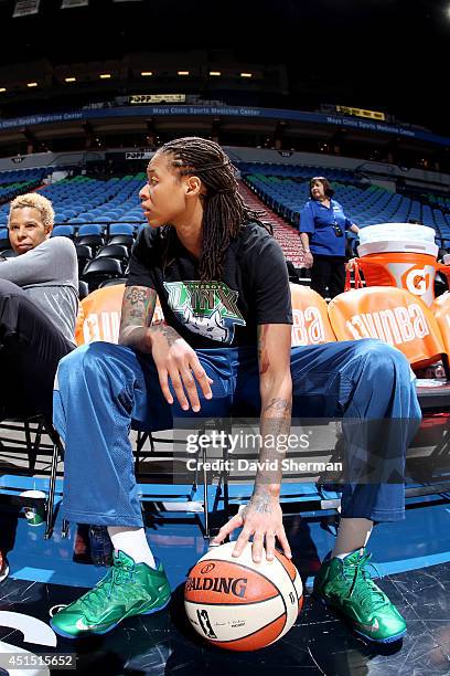 Seimone Augustus of the Minnesota Lynx sits on the sideline during a game against the Australian Opals on May 5, 2014 at Target Center in...