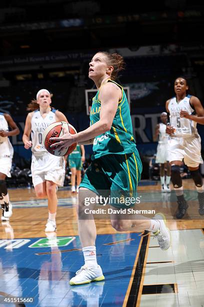 Natalie Hurst of the Australian Opals drives against the Minnesota Lynx on May 5, 2014 at Target Center in Minneapolis, Minnesota. NOTE TO USER: User...