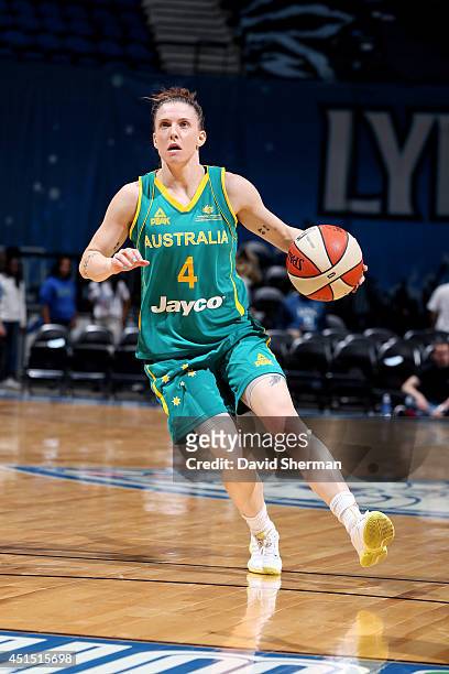 Natalie Hurst of the Australian Opals drives against the Minnesota Lynx on May 5, 2014 at Target Center in Minneapolis, Minnesota. NOTE TO USER: User...